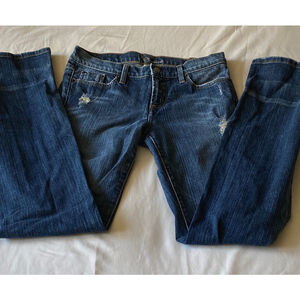 NWOT BEBE Women’s Distressed Jeans with Red Rhinestones in the Back Pockets!